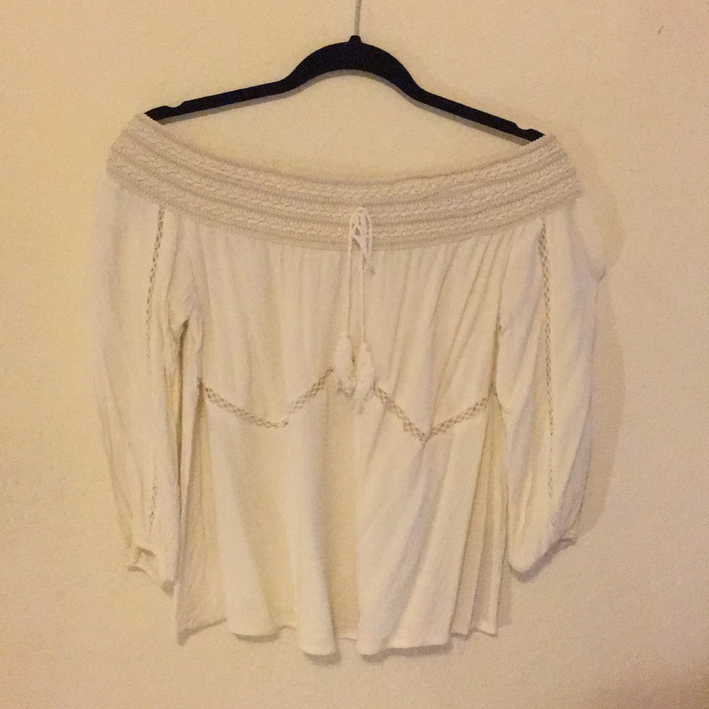 Off the shoulder cream shirt
